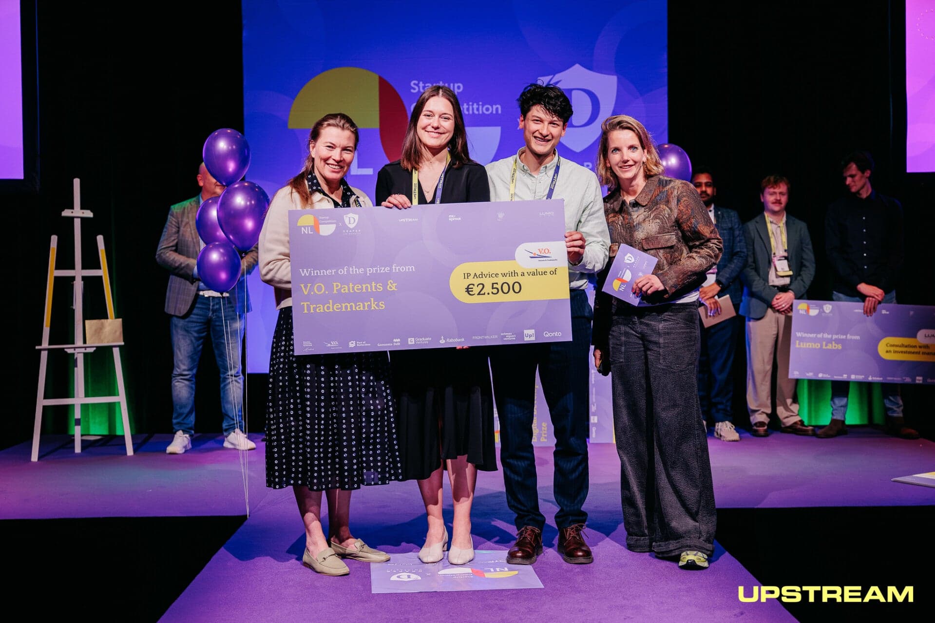 The AKIN team on stage at Upstream Festival for the NL Startup Competition finale